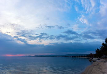 The waterfront of Nikiti in Chalkidiki, Greece, at dusk 