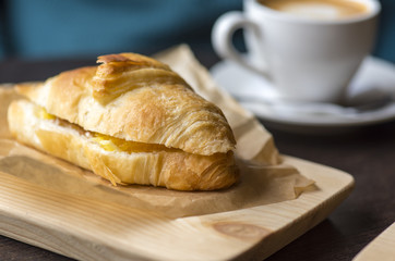 Fresh croissant and black coffee in the morning for the breakfast in France