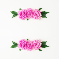 Wreath floral frame with pink roses and leaves on white background. Flat lay, top view