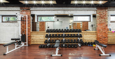 Interior view of a gym with equipment.