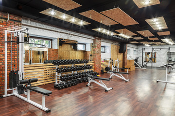 Interior view of a gym with equipment.