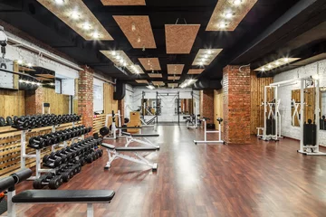 Wall murals Fitness Interior view of a gym with equipment.
