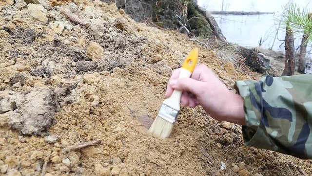 Archaeology: discovery of a piece of ancient pottery in the dump soil from the excavation