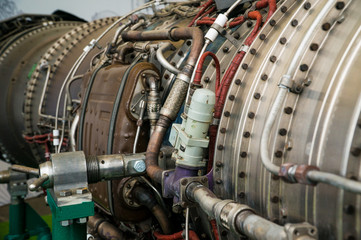 Side view of jet airplane engine close up.