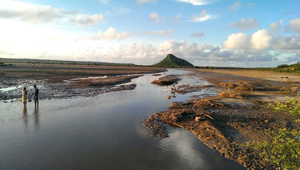 some guys fishing on a river in madagascar