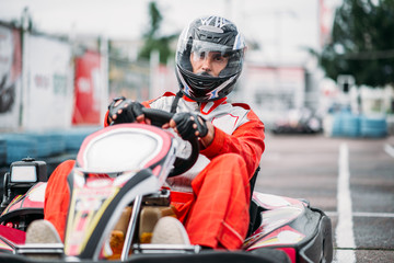 Karting racer in action, go kart competition - obrazy, fototapety, plakaty