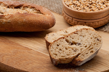 sliced baguette bread on wooden table