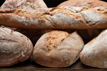 Bread arranged on wooden table