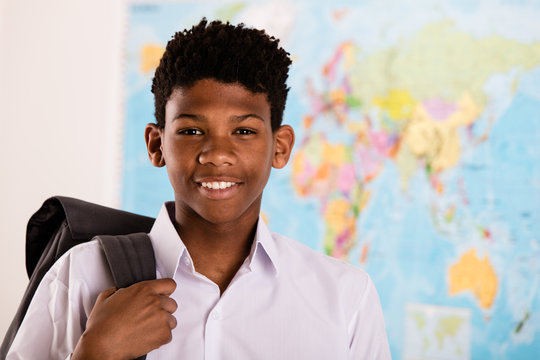 African Boy In His School Uniform And Backpack
