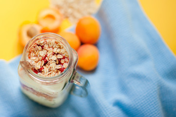 Yogurt with cereal and apricots for Breakfast