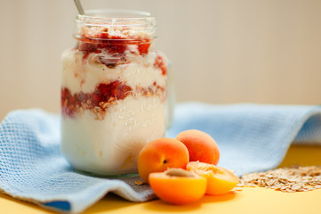 Yogurt with cereal and apricots for Breakfast