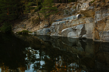 Quarry rocks with reflection