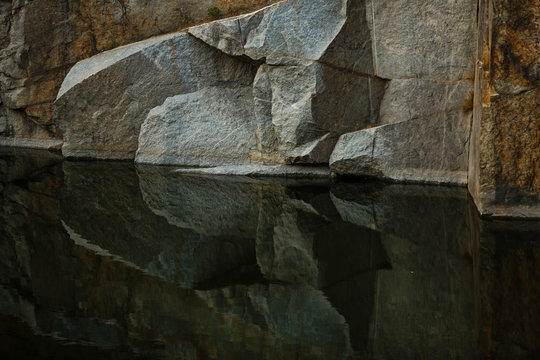 Quarry rocks with reflection