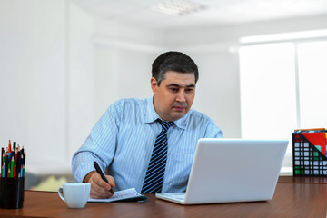 Fototapeta premium Businessman working in the office