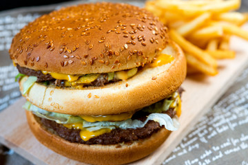 Cheese burger - American cheese burger with Golden French fries