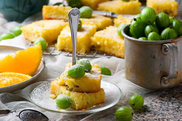 Gooseberry and  orange drizzle cake