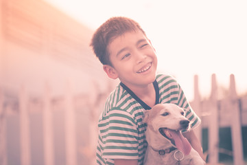 Little boy walking outside with dog jack russel summer time © wckiw