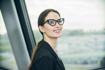 Portrait of a smiling businesswoman in business center