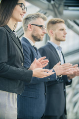 close-up of businessmen applauded
