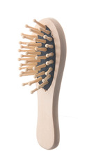 Wood hairbrush isolated on white background.