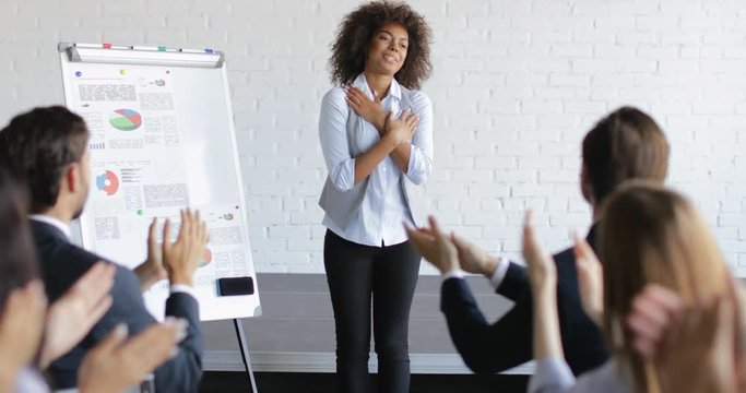 Group Of Business People Applauding Congradulating Happy African American Businesswoman With Successful Speech During Conference Meeting Slow Motion 60