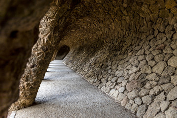 Tunnel passage with pillars from north at park Güell in Barcelona