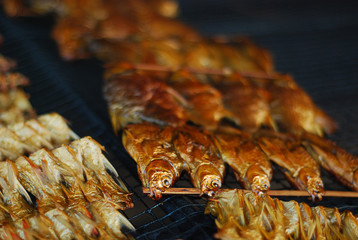 Thai trditional smoked dried fish to preserve food.