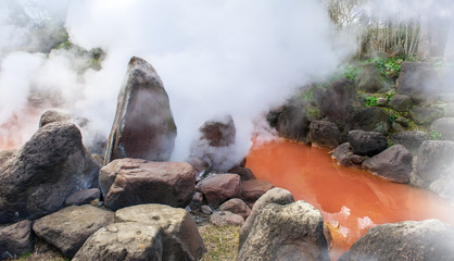 Hot spring water (Hells), red pond in Umi Jigoku at Beppu, Oita-shi, Kyushu, Japan