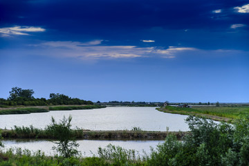 Landscape of pond with beautiful blue sky