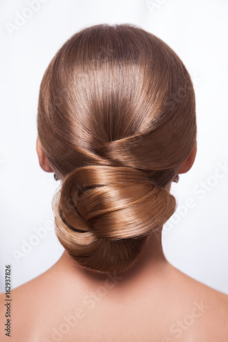 Back View Of Beautiful Woman With Creative Elegant Hairstyle