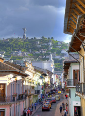 View of downtown Quito with the Panecillo hill in the background, on a cloudy and overcast day