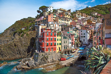 Fototapeta na wymiar Incredible landscape in Riomaggiore with leaves of agave in Cinque Terre, Liguria, Italy, Europe