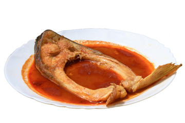 Plate fish soup with a piece of fish