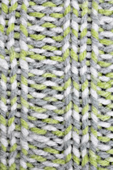 Knitted Background / knitted background, blank, white and light green sprinkled, close up, full frame, macro, vertical