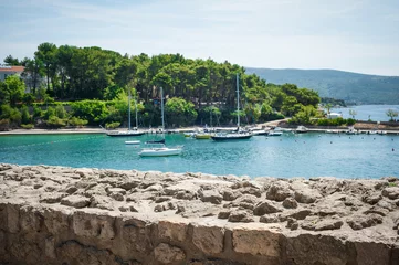 Foto op Canvas Beautiful seascape with white yacht sailing in blue mediterranean sea © guruXOX