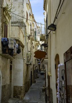 Apulia, Vieste old town, south Italy.Typical italian medieval narrow street.