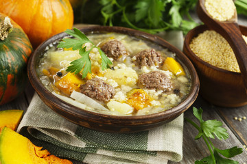 Cabbage soup with meatballs and pumpkin