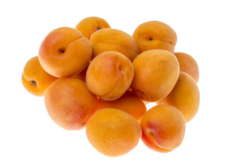 Ripe fresh small apricots isolated on white background.