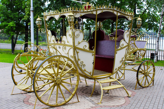 Golden carriage in the park, retro