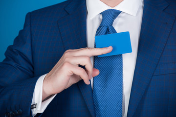 business or bank card in male hand