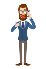 Hipster Businessman pointing his finger at the mobile phone that he talks