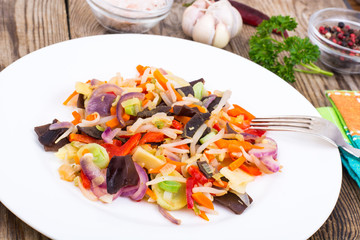 Mix of vegetables with mushrooms mun, sprouts of soybeans in pla