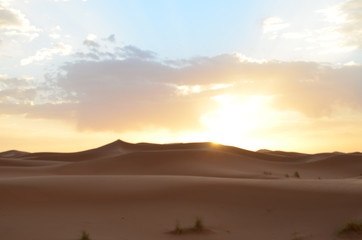 Fototapeta na wymiar Sand Dunes in sunrise of Sahara Great Desert in High Atlas Mountains, Morocco