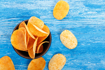 potato chips in a clay plate