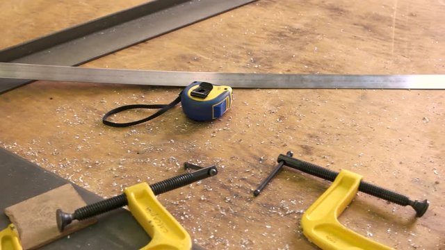 Ruler and tape measure. Measuring tools on wood background. Easy building projects.