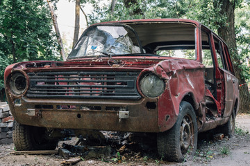 Old broken abandoned rusty retro car