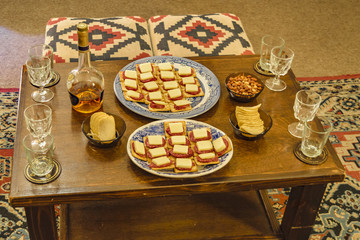 Cold Meat and Alcoholic Drink at Table Living Room