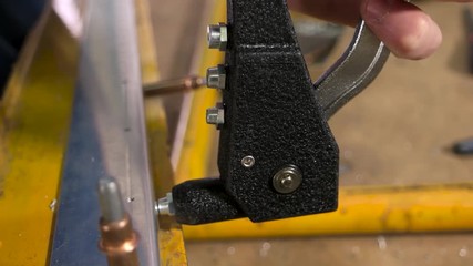 Rivet gun close up. Tool riveting metal detail.
