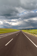 Highway. Open views and sunny weather to travel.