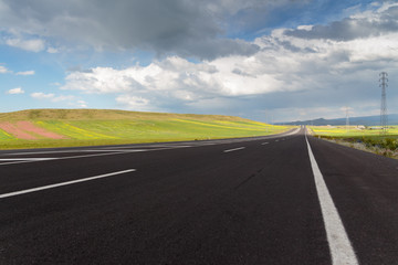 Highway. Open views and sunny weather to travel.